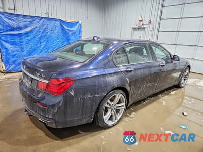 Trzecie zdjęcie samochodu z tyłu: 2015 BMW 750 LXI VIN:WBAYF8C50FD654860 - miniatura