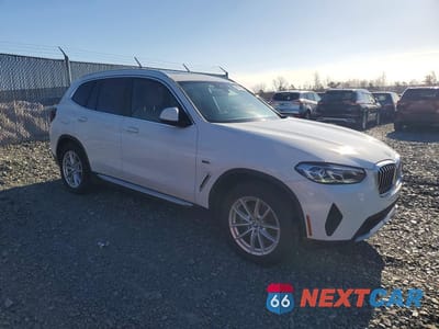 Czwarte zdjęcie samochodu z boku: 2022 BMW X3 XDRIVE30E VIN:5UX63DP06N9M76785 - miniatura