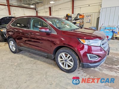 Czwarte zdjęcie samochodu z boku: 2017 FORD EDGE SEL VIN:2FMPK4J89HBB67399 - miniatura