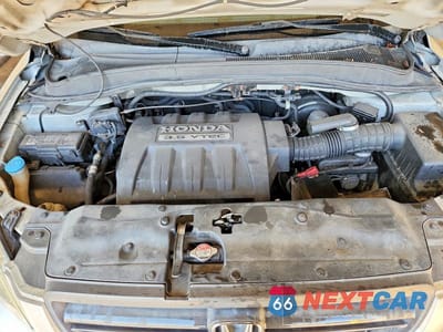 Zdjęcie 11 z 12 samochodu: 2005 HONDA PILOT EXL VIN:2HKYF18535H523210 - miniatura