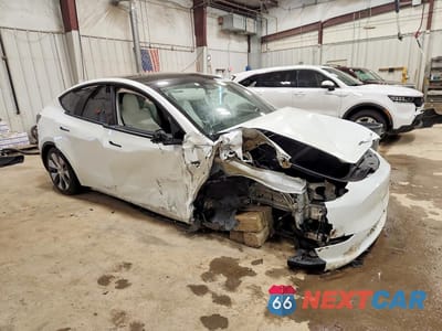 Czwarte zdjęcie samochodu z boku: 2022 TESLA MODEL Y VIN:7SAYGDEE4NF354674 - miniatura