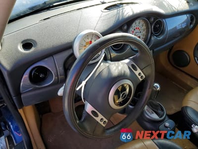 Zdjęcie 8 z 12 samochodu: 2003 MINI COOPER VIN:WMWRC33473TJ52078 - miniatura