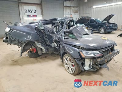 Czwarte zdjęcie samochodu z boku: 2014 VOLKSWAGEN JETTA GLI VIN:3VW4S7AJ4EM303005 - miniatura