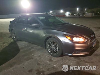 Czwarte zdjęcie samochodu z boku: 2018 NISSAN ALTIMA 2.5 SR VIN:1N4AL3AP2JC284827 - miniatura