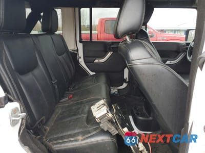 Zdjęcie 11 z 13 samochodu: 2013 JEEP WRANGLER UNLIMITED SAHARA VIN:1C4BJWEG8DL695038 - miniatura