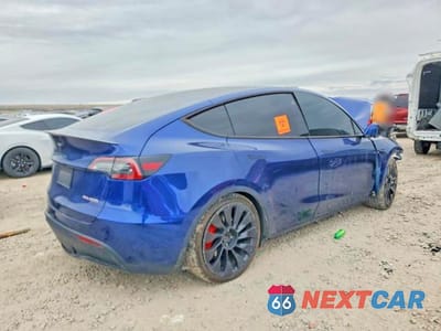 Trzecie zdjęcie samochodu z tyłu: 2022 TESLA MODEL Y VIN:7SAYGDEF4NF407088 - miniatura