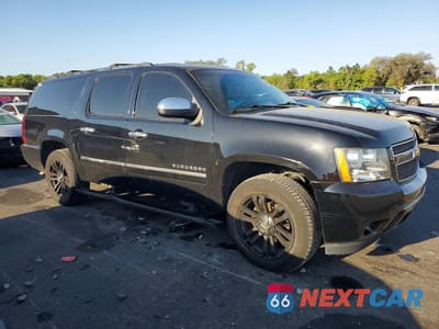 Czwarte zdjęcie samochodu z boku: 2014 CHEVROLET SUBURBAN C1500 LTZ VIN:1GNSCKE01ER206944 - miniatura