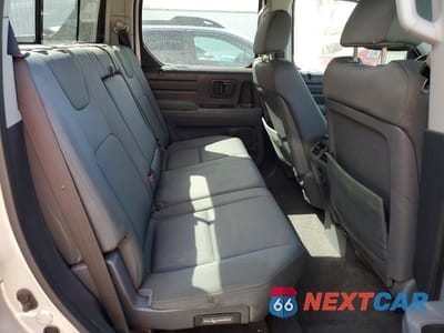Zdjęcie 11 z 14 samochodu: 2008 HONDA RIDGELINE RTX VIN:2HJYK16348H509208 - miniatura