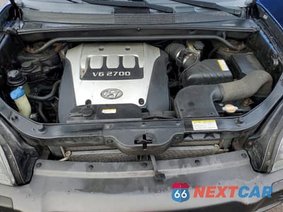 Zdjęcie 12 z 13 samochodu: 2006 HYUNDAI TUCSON GL VIN:KM8JM72D46U302096 - miniatura