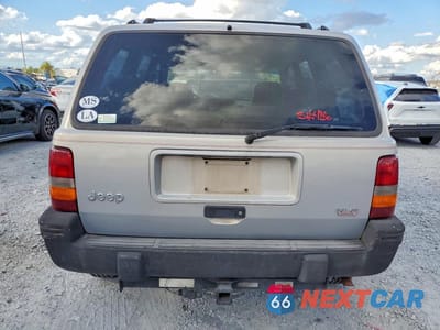 Zdjęcie 6 z 12 samochodu: 1995 JEEP GRAND CHEROKEE LAREDO VIN:1J4GZ58S1SC598053 - miniatura