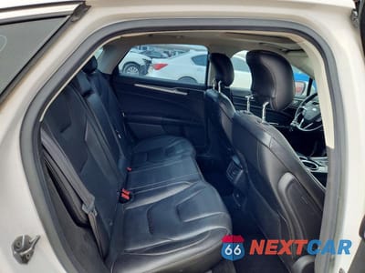 Zdjęcie 10 z 12 samochodu: 2013 FORD FUSION TITANIUM VIN:3FA6P0D95DR190534 - miniatura