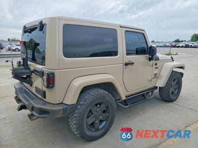Trzecie zdjęcie samochodu z tyłu: 2016 JEEP WRANGLER SAHARA VIN:1C4AJWBG9GL285594 - miniatura