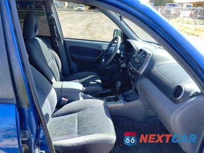 Piąte zdjęcie samochodu w środku: 2003 TOYOTA RAV4 BASE VIN:JTEGH20V030087140 - miniatura