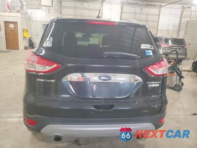 Zdjęcie 6 z 11 samochodu: 2014 FORD ESCAPE TITANIUM VIN:1FMCU0JX9EUB30223 - miniatura