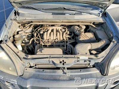 Zdjęcie 12 z 14 samochodu: 2007 HYUNDAI TUCSON SE VIN:KM8JN12D97U522037 - miniatura