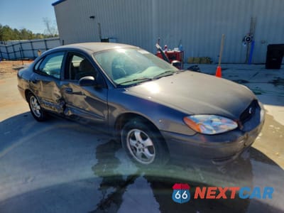 Czwarte zdjęcie samochodu z boku: 2005 FORD TAURUS SE VIN:1FAHP53225A187659 - miniatura