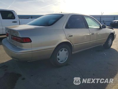 Trzecie zdjęcie samochodu z tyłu: 1999 TOYOTA CAMRY CE VIN:4T1BG22K7XU611043 - miniatura