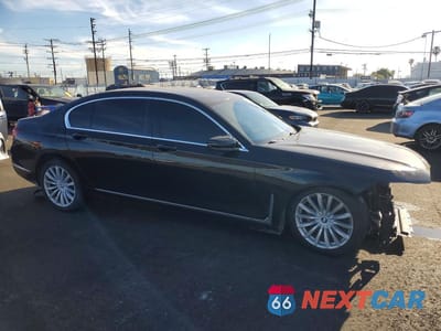 Czwarte zdjęcie samochodu z boku: 2022 BMW 740 I VIN:WBA7T2C04NCJ55439 - miniatura