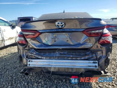 Zdjęcie 6 z 12 samochodu: 2021 TOYOTA CAMRY HYBRID XSE VIN:4T1K31AK1MU565793 - miniatura