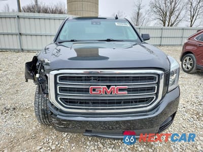 Piąte zdjęcie samochodu w środku: 2018 GMC YUKON SLT VIN:1GKS2BKC4JR377714 - miniatura