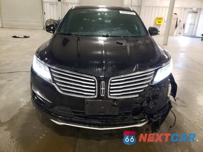 Piąte zdjęcie samochodu w środku: 2016 LINCOLN MKC SELECT VIN:5LMCJ2D96GUJ20394 - miniatura