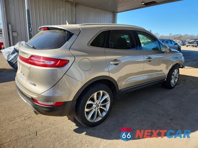 Trzecie zdjęcie samochodu z tyłu: 2015 LINCOLN MKC VIN:5LMCJ2A94FUJ19795 - miniatura