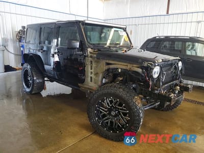 Czwarte zdjęcie samochodu z boku: 2015 JEEP WRANGLER UNLIMITED SAHARA VIN:1C4BJWEG8FL509209 - miniatura