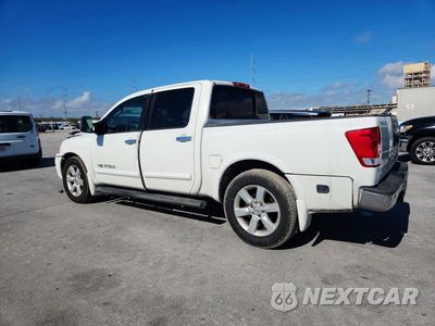 Trzecie zdjęcie samochodu z tyłu: 2009 NISSAN TITAN XE FFV VIN:1N6BA07D49N306680 - miniatura