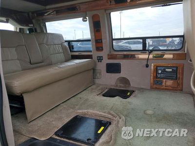 Zdjęcie 11 z 14 samochodu: 2002 FORD ECONOLINE E150 VAN VIN:1FDRE14LX2HB81384 - miniatura