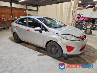 Czwarte zdjęcie samochodu z boku: 2013 FORD FIESTA SE VIN:3FADP4BJ8DM207383 - miniatura