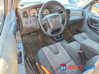 Zdjęcie 8 z 12 samochodu: 2004 MAZDA B3000 CAB PLUS VIN:4F4YR16UX4TM00815 - miniatura