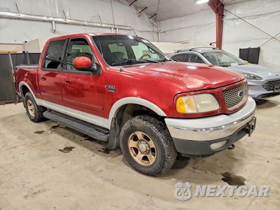 Czwarte zdjęcie samochodu z boku: 2001 FORD F150 SUPERCREW VIN:1FTRW08L51KB66721 - miniatura