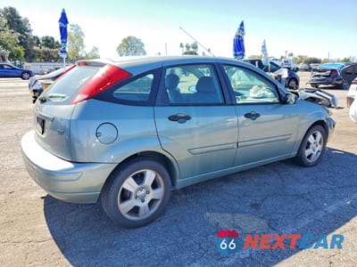Trzecie zdjęcie samochodu z tyłu: 2004 FORD FOCUS ZX5 VIN:3FAFP37Z74R110972 - miniatura