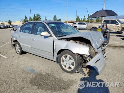 Czwarte zdjęcie samochodu z boku: 2004 HYUNDAI ELANTRA GLS VIN:KMHDN46D44U730556 - miniatura