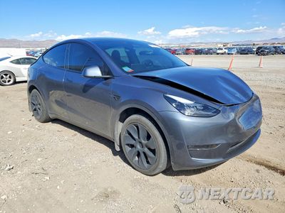 Czwarte zdjęcie samochodu z boku: 2023 TESLA MODEL Y VIN:7SAYGDEE3PF744538 - miniatura