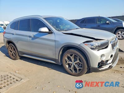 Czwarte zdjęcie samochodu z boku: 2019 BMW X1 SDRIVE28I VIN:WBXHU7C54K5L10118 - miniatura