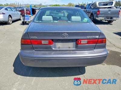 Zdjęcie 6 z 11 samochodu: 1999 TOYOTA CAMRY LE VIN:JT2BG22K0X0309517 - miniatura