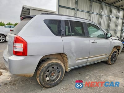 Trzecie zdjęcie samochodu z tyłu: 2010 JEEP COMPASS SPORT 4D SUV VIN:1J4NT4FB8AD560432 - miniatura