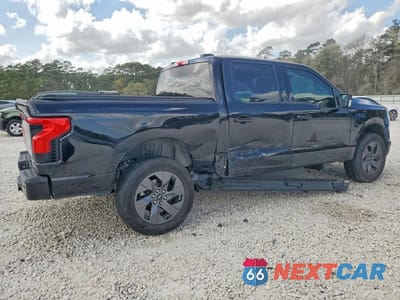 Trzecie zdjęcie samochodu z tyłu: 2024 FORD F150 LIGHTNING XLT VIN:1FTVW3L70RWG16970 - miniatura