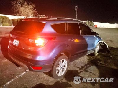 Trzecie zdjęcie samochodu z tyłu: 2018 FORD ESCAPE SEL VIN:1FMCU9HD4JUB52933 - miniatura