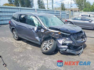 Czwarte zdjęcie samochodu z boku: 2017 HONDA PILOT ELITE VIN:5FNYF6H03HB092369 - miniatura