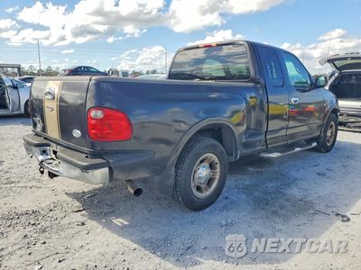 Trzecie zdjęcie samochodu z tyłu: 2001 FORD F150 VIN:2FTRX07L81CA15889 - miniatura