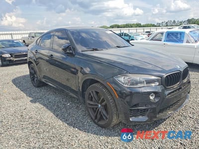 Czwarte zdjęcie samochodu z boku: 2019 BMW X6 M VIN:5YMKW8C52KLR38331 - miniatura