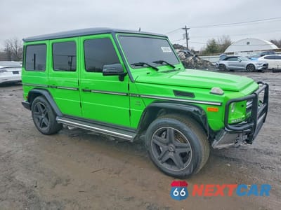 Czwarte zdjęcie samochodu z boku: 2015 MERCEDES-BENZ G 63 AMG VIN:WDCYC7DF2FX234328 - miniatura