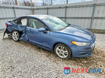 Czwarte zdjęcie samochodu z boku: 2018 FORD FUSION SE HYBRID VIN:3FA6P0LU6JR261077 - miniatura