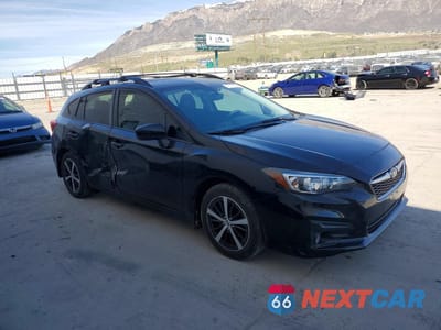 Czwarte zdjęcie samochodu z boku: 2019 SUBARU IMPREZA PREMIUM VIN:4S3GTAD64K3754658 - miniatura