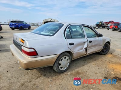 Trzecie zdjęcie samochodu z tyłu: 1997 TOYOTA COROLLA BASE VIN:1NXBA02E3VZ519828 - miniatura