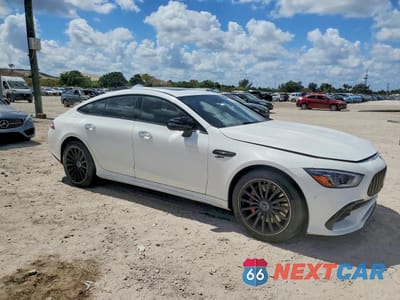 Czwarte zdjęcie samochodu z boku: 2022 MERCEDES-BENZ AMG GT 43 VIN:W1K7X5KB7NA048205 - miniatura