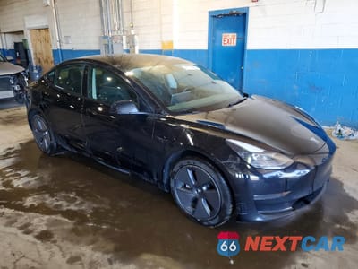 Czwarte zdjęcie samochodu z boku: 2023 TESLA MODEL 3 VIN:5YJ3E1EB6PF388216 - miniatura