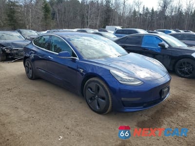 Czwarte zdjęcie samochodu z boku: 2018 TESLA MODEL 3 VIN:5YJ3E1EB0JF127087 - miniatura
